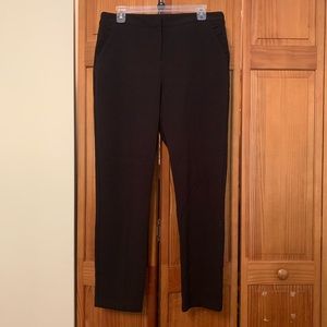 Black skinny-leg slacks